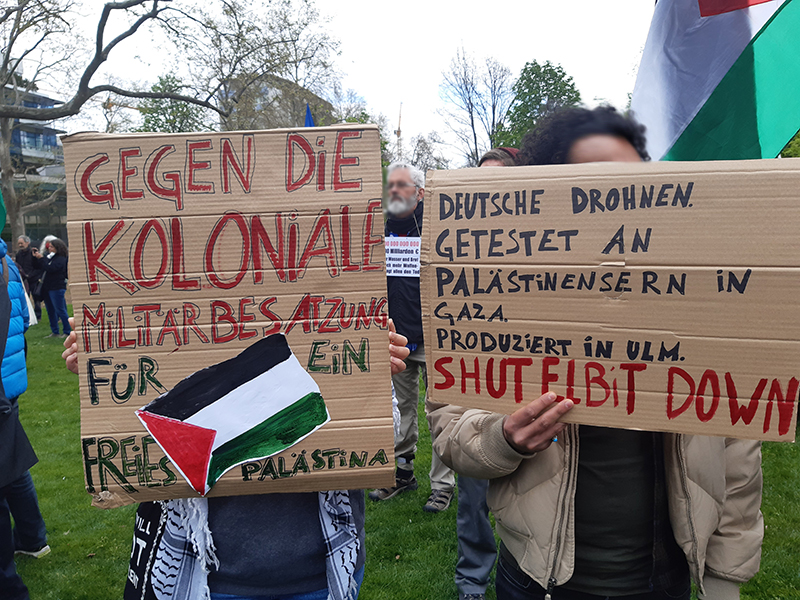 Plakat - Gegen die koloniale Militärbesatzung und Drohnen aus Ulm, shut Elbit down